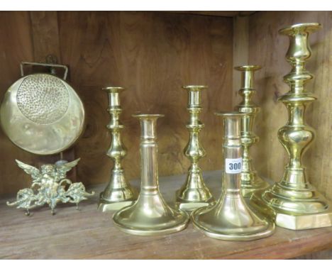 ANTIQUE METALWARE, pair of Georgian design oval base brass candlesticks together with two other Victorian pairs and bracket g