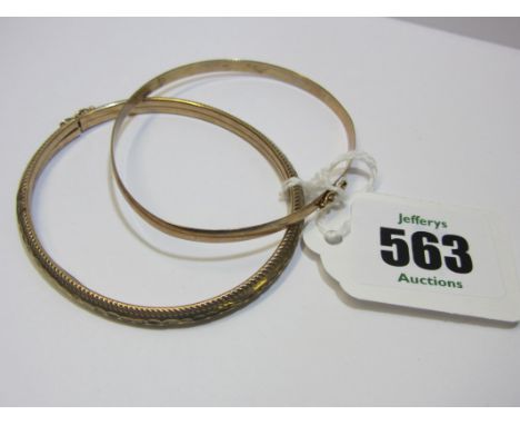 GOLD BANGLE, 9ct gold bangle, also a yellow metal hinged bangle 