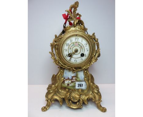 19TH CENTURY FRENCH BRACKET CLOCK, gilt scroll case bracket clock with inset painted porcelain panels together with key, 13.5