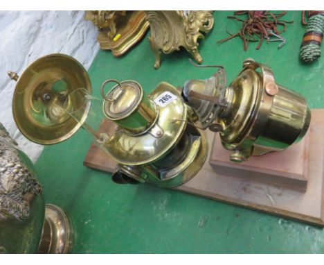 MARITIME, gimballed brass wall fitted oil lamp together with small brass cased navigation lantern 