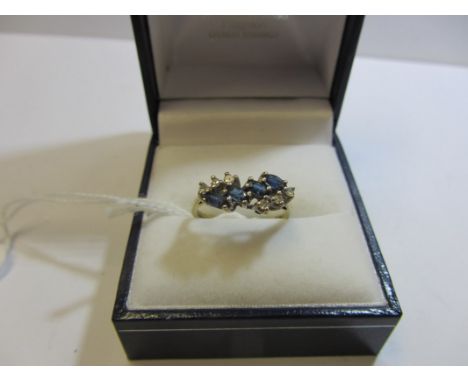 DIAMOND & SAPPHIRE CLUSTER, 9ct yellow gold ring set an unusual cluster of sapphires and diamonds, size K/L