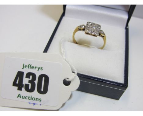 DIAMOND RING, 18ct yellow gold ring set a plaque of diamonds with diamond shoulders.  Ring size M 