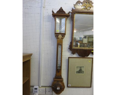 ARTS & CRAFT MERCURY STICK BAROMETER, carved oak case stick barometer with inset thermometer dial and architectural pediments