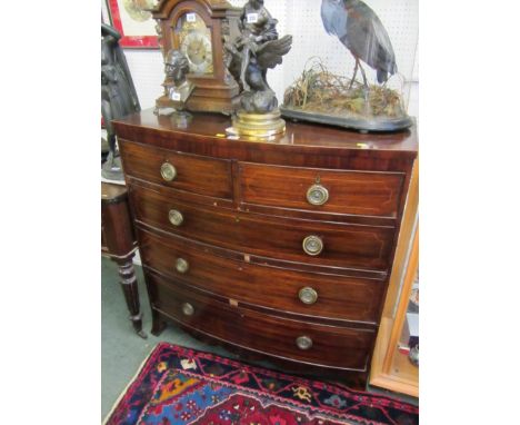 GEORGIAN BOW FRONT CHEST, of 2 short, 2 long graduated drawers on splayed bracket feet and ring drop handles with boxwood str