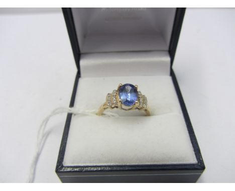 TANZANITE RING, 9ct yellow gold tanzanite ring with diamond shoulders, size N