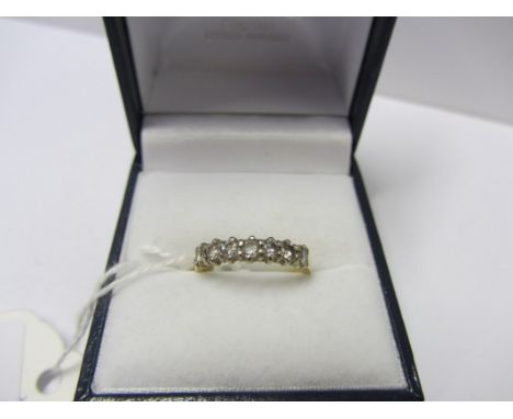 DIAMOND RING, 7 stone diamond ring on an 18ct yellow gold mount, ring size J/K