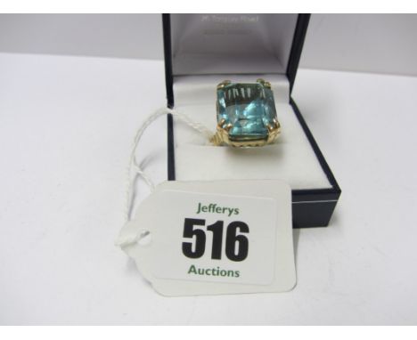 AQUAMARINE RING, large rectangular cut aquamarine ring on a 9ct yellow gold mount,   the stone approx. 20mm x 16mm ring size 