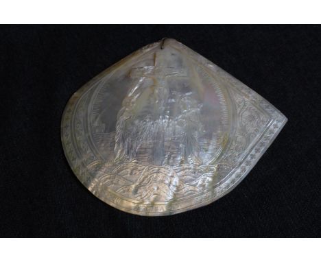 Early 20thC Mother of Pearl Religious carved Shell depicting the Crucifixion of Christ, 23cm in Diameter 