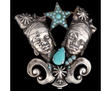 An Egyptian turquoise glass figural brooch, unmarked white metal settings with female head and star motif, height 56mm, 12.6g