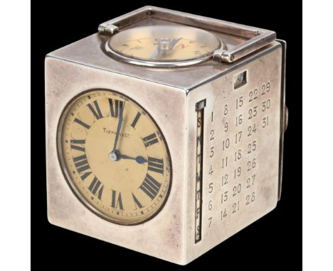 TIFFANY & CO - an Art Deco French silver combination desk clock compendium, circa 1920, cube form with four sides displaying 