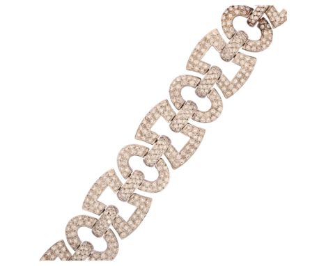A modern 18ct white gold diamond panel bracelet, geometric design with square and oval panels, set with modern round brillian