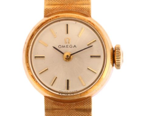 OMEGA - a lady's 9ct gold mechanical bracelet watch, circa 1966, silvered dial with applied gilt baton hour markers and 9ct t