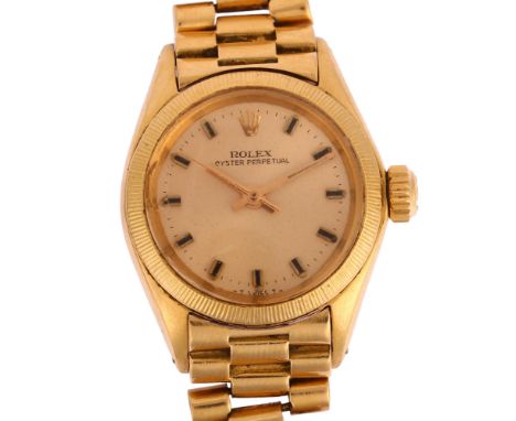 ROLEX - a lady's 18ct gold Oyster Perpetual automatic bracelet watch, ref. 6617, champagne dial with applied baton hour marke