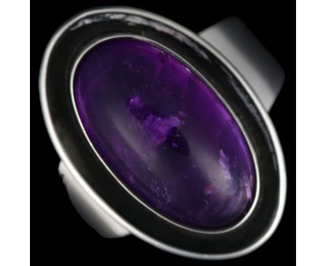 NIELS ERIK FROM - a mid-20th century Danish modernist sterling silver and amethyst ring, circa 1960s, set with oval cabochon 