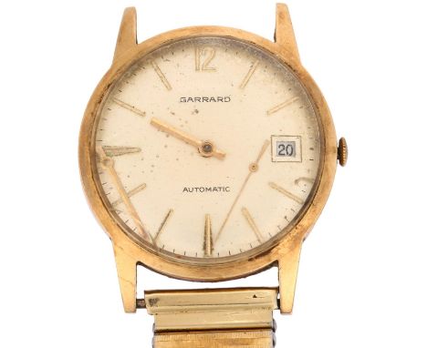GARRARD - a 9ct gold automatic wristwatch, silvered dial with applied gilt baton hour markers and date aperture, case width 3