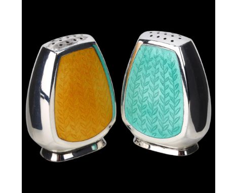 ANTON MICHELSEN - a pair of a Danish modernist sterling silver and polychrome enamel pepperettes, arrowhead form with yellow 