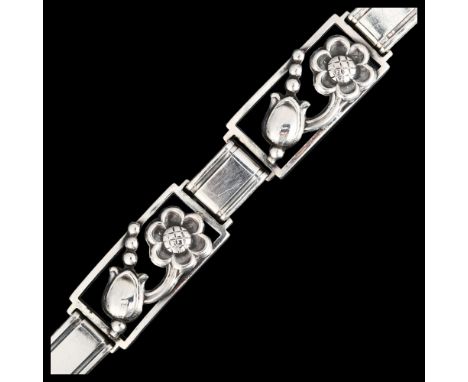 HANS JENSEN & CO - an Art Deco Danish silver floral panel bracelet, band width 16.1mm, length 18.5cm, 21.3gNo damage or repai