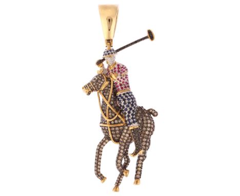 A large modern 9ct gold sapphire ruby and diamond 3-dimensional polo player pendant, pave set with round-cut gemstones, unsig