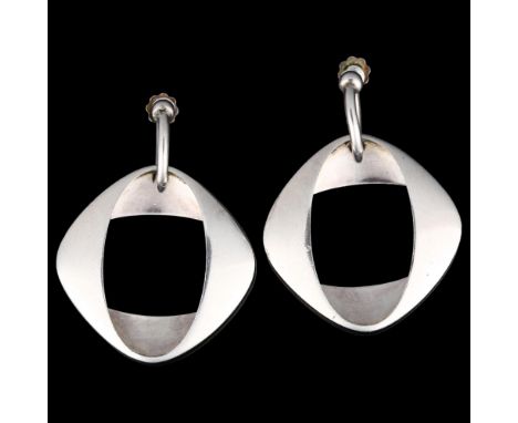 GEORG JENSEN - a pair of a Danish modernist sterling silver folded circle drop earrings, designed by Henning Koppel, model no