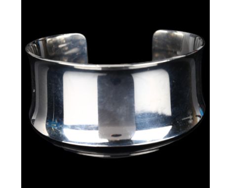 NIELS ERIK FROM - a Danish modernist sterling silver plain cuff bangle, with flared rims, setting height 28.6mm, internal cir