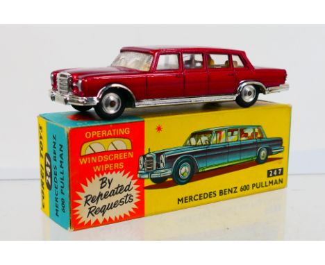 Corgi Toys - A boxed Corgi Toys #247 Mercedes Benz 600 Pullman. The model in metallic maroon and cream interior, comes with w