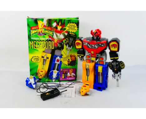 Power Rangers - Marchon. A boxed 1994 Marchon made #33500 Remote Controlled Megazord in 36cm size. Item appears in excellent 