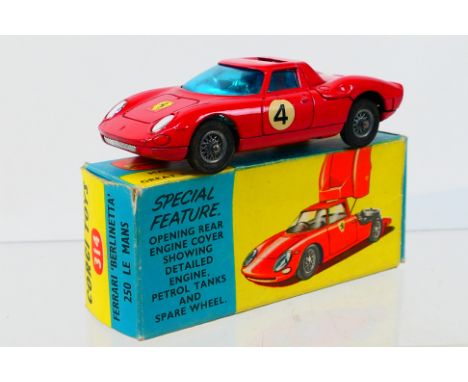 Corgi Toys - A boxed Corgi Toys #314 Ferrari 'Berlinetta' 250 Le Mans. The model in red with RN4 and wire wheels, has a few s