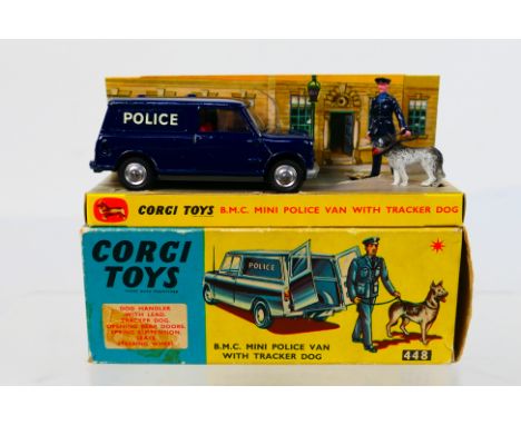 Corgi Toys - A boxed Corgi Toys #448 BMC Mini Police Van with Tracker Dog. The model in dark blue with red interior plus Poli