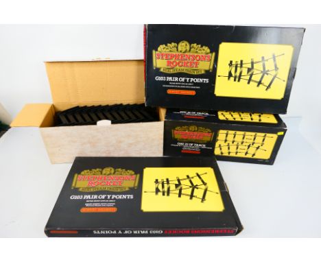 Hornby - Unsold shop stock - 3 x boxed items, Stephensons Rocket track pack # G102 and 2 x packs of points # G103. The conten