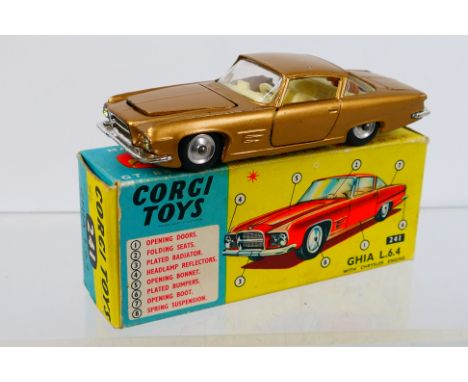 Corgi Toys - A boxed Corgi Toys #241 Ghia L6.4. The model in metallic gold with cream interior and spun hubs, has a couple of