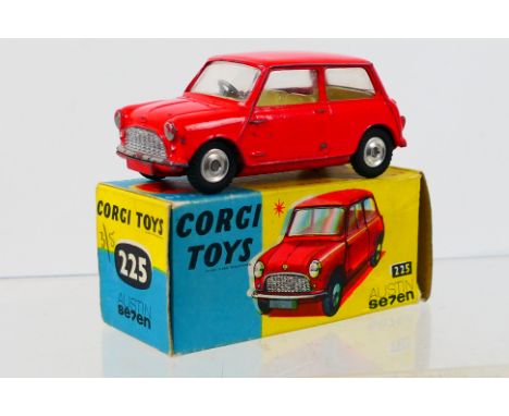 Corgi Toys - A boxed Corgi Toys #225 Austin Seven. The model with red body, lemon interior and spun hubs, has a few small mar