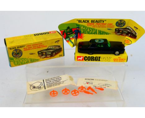 Corgi Toys - A boxed Corgi Toys #268 The Green Hornet 'Black Beauty'. The model in black with green interior with plastic fig
