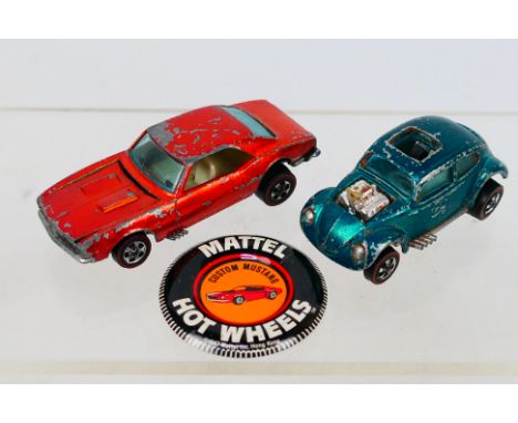 Hot Wheels - Redline. Two loose Redline's and a Mattel Hot Wheels badge. A Hong Kong Uncommon Orange Camaro appearing in play