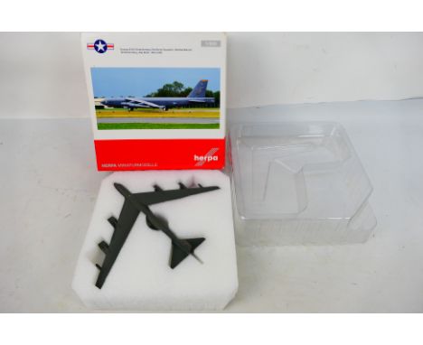 Herpa - A boxed diecast 1:200 scale Herpa #555739 USAF Boeing B-52H Stratofortress, 23rd BS "Bomber Barons", 5th Bomb Wing "W