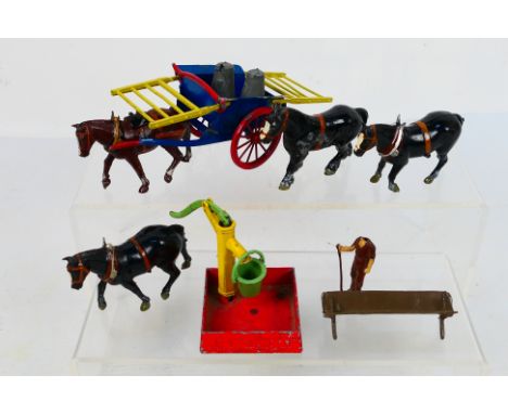 Britains - A Tumbrel Cart with horse and farm hand # 308 with three other horses, a village pump and a feeding trough. They s