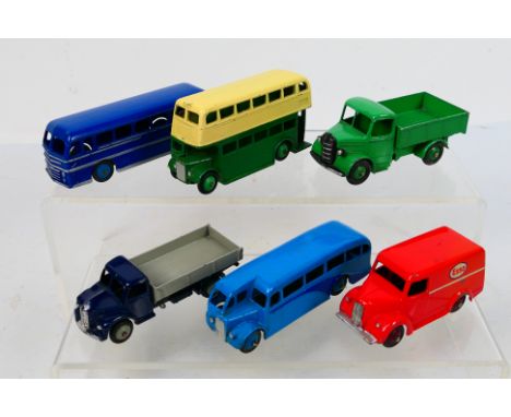 Dinky - A group of unboxed vehicles including Bedford truck # 25w, Trojan Esso van # 31a, Leyland Royal Tiger bus # 29h and o