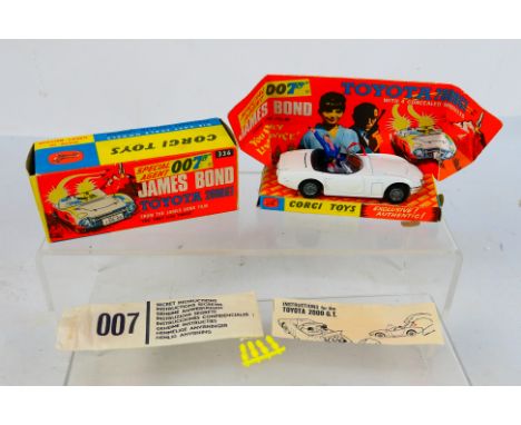 Corgi Toys - A boxed Corgi Toys #336 'James Bonds Toyota 2000GT' from 'You Only Live Twice'. The model in white with red aeri