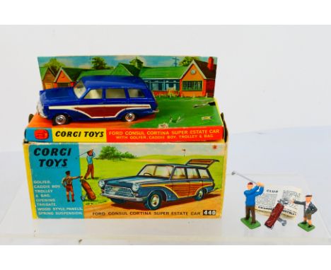 Corgi Toys - A boxed Corgi Toys #440 Ford Consul Cortina Super Estate car. The model in metallic dark blue with brown side pa