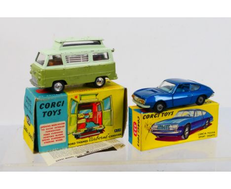 Corgi Toys - Two boxed diecast vehicles from Corgi. Lot consists of #332 Lancia Fulvia Sport Zagato in metallic blue with blu