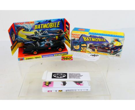 Corgi Toys - A boxed Corgi Toys #267 Batmobile. The model with gloss black body, orange 'Bat' logo on doors, with gold cast h