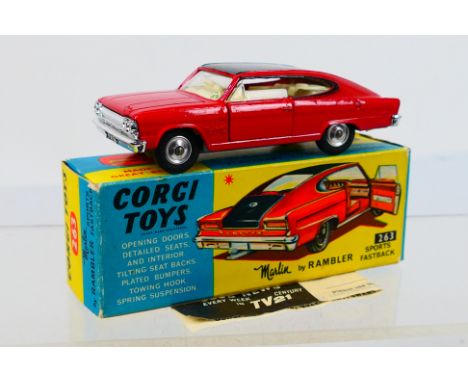 Corgi Toys - A boxed Corgi Toys #263 Marlin Rambler Sports Fastback. The model with red body and black roof, white interior a