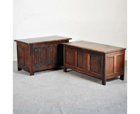 A mid 20th century oak coffer, with linenfold panels, 106cm wide, together with another smaller (2)106w x 47d x 51h cm