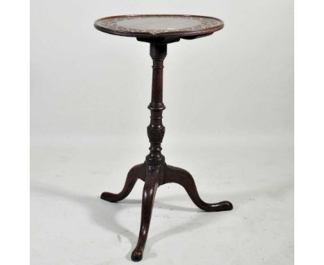 A 19th century carved oak occasional table, on a tripod base44w x 72h cm