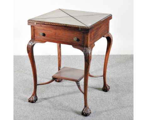 An Edwardian envelope card table, on claw and ball feet82w x 82d x 76h cm