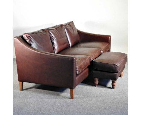 A modern brown leather upholstered three seater sofa, together with a matching footstool (2)191w x 90d x 84h cm