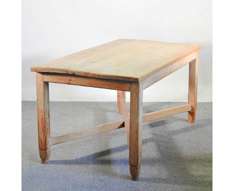 A pine farmhouse dining table, with an x-frame stretcher160w x 84d x 76h cmOverall condition is solid and usable. The top has