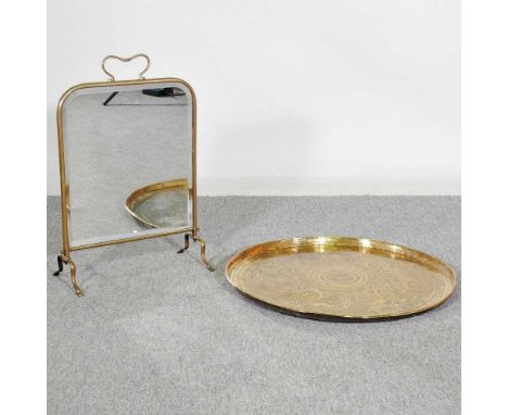 A large Indian brass tray, together with a brass mirrored fire screen (2)