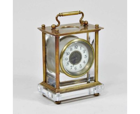 A brass and glass cased carriage clock, 14cm high