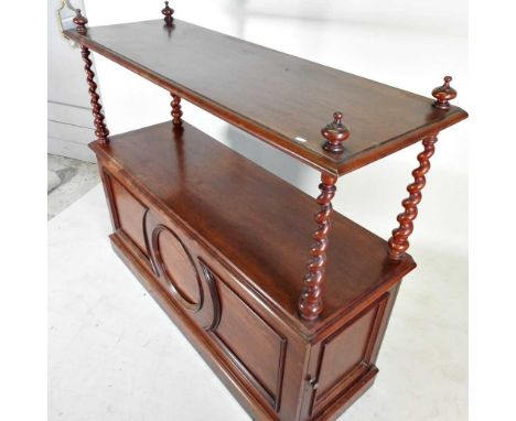 A Victorian mahogany buffet/table leaf holder, with spirally turned supports and a panelled door to one end153w x 52d x 130h 