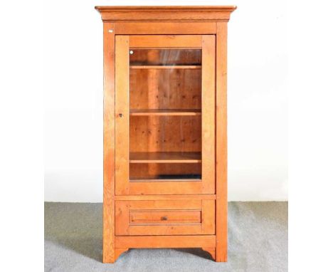 A modern light oak glazed cabinet99w x 41d x 172h cm